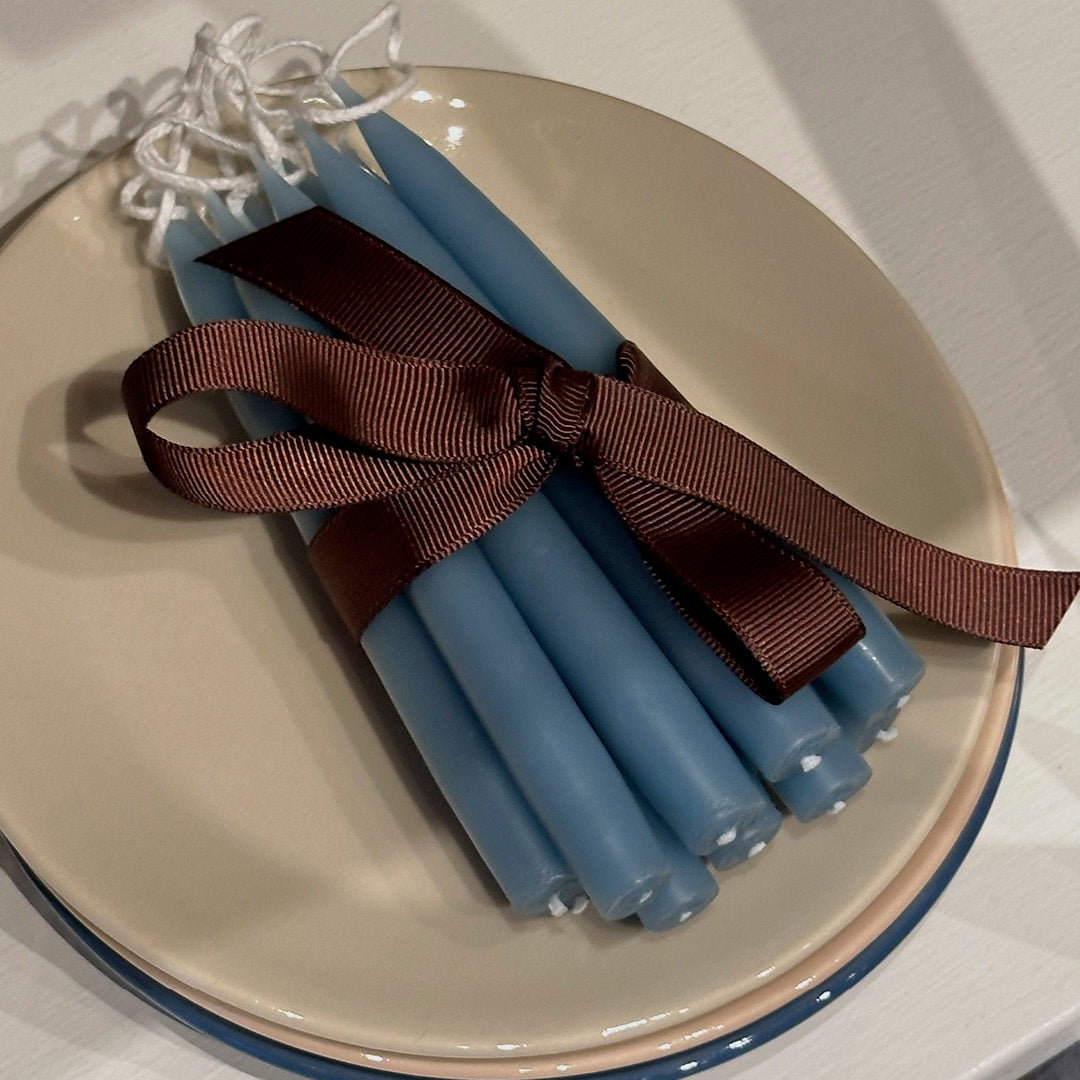 small set of candles in blue