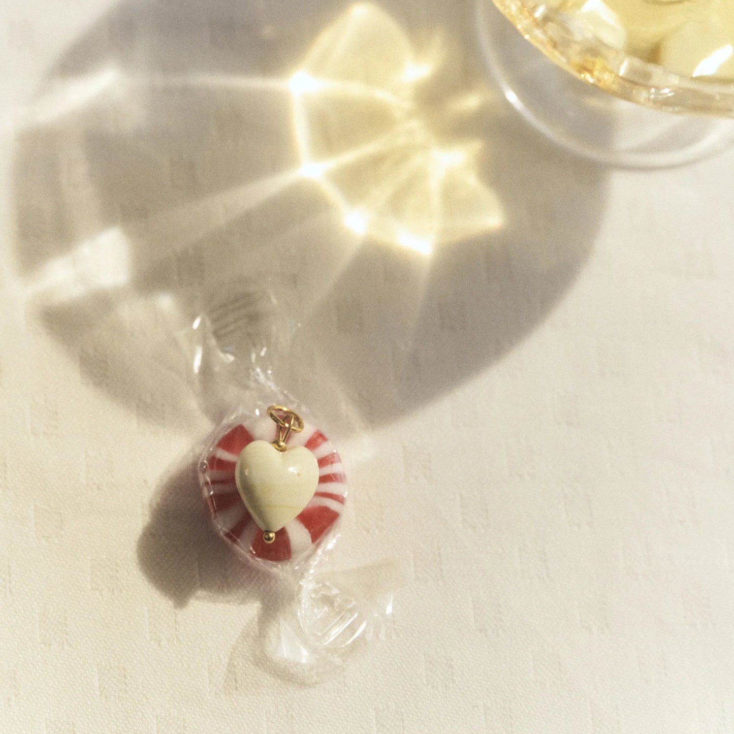 uma pendant • ivory