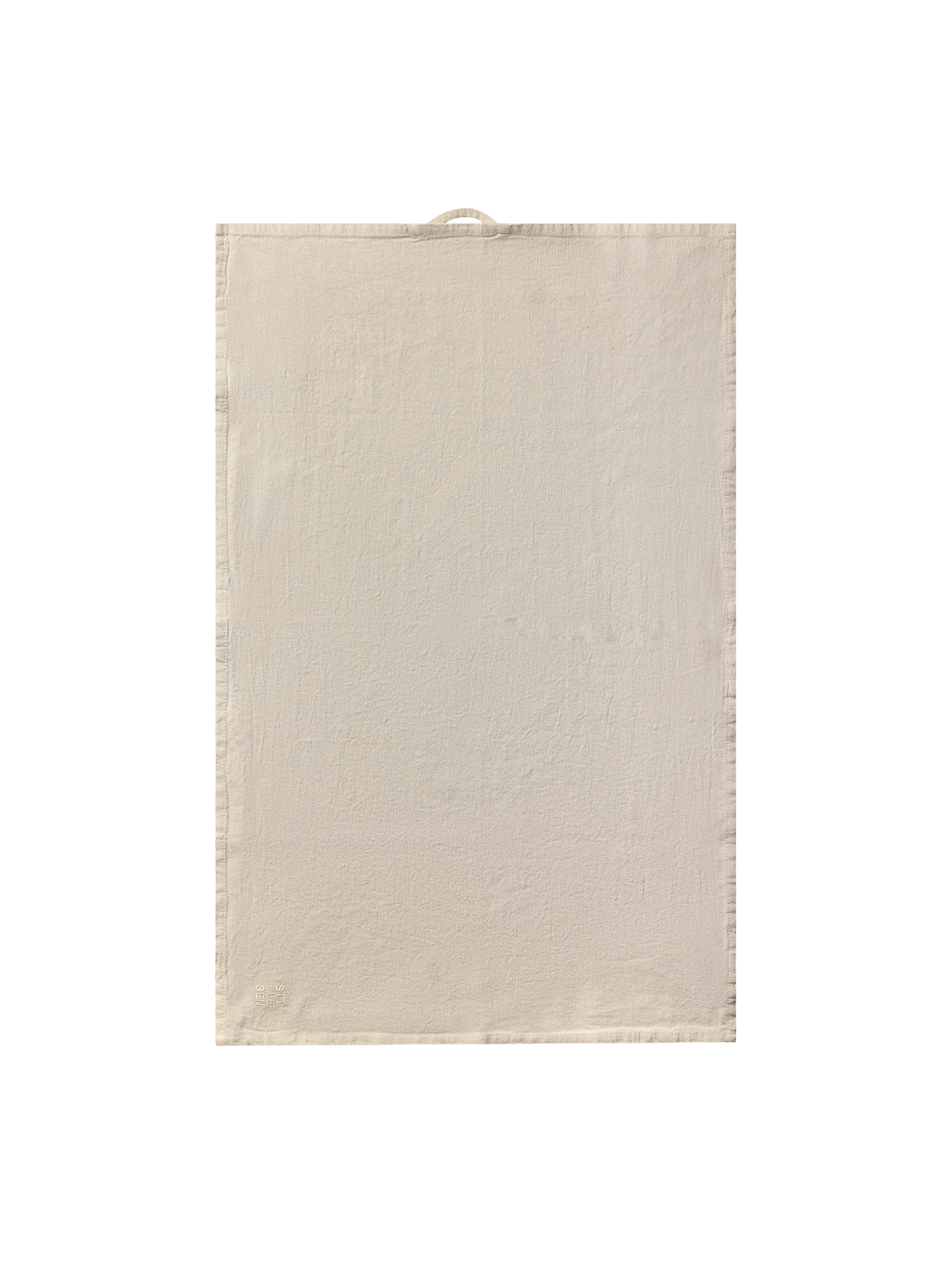 tea towel in sand