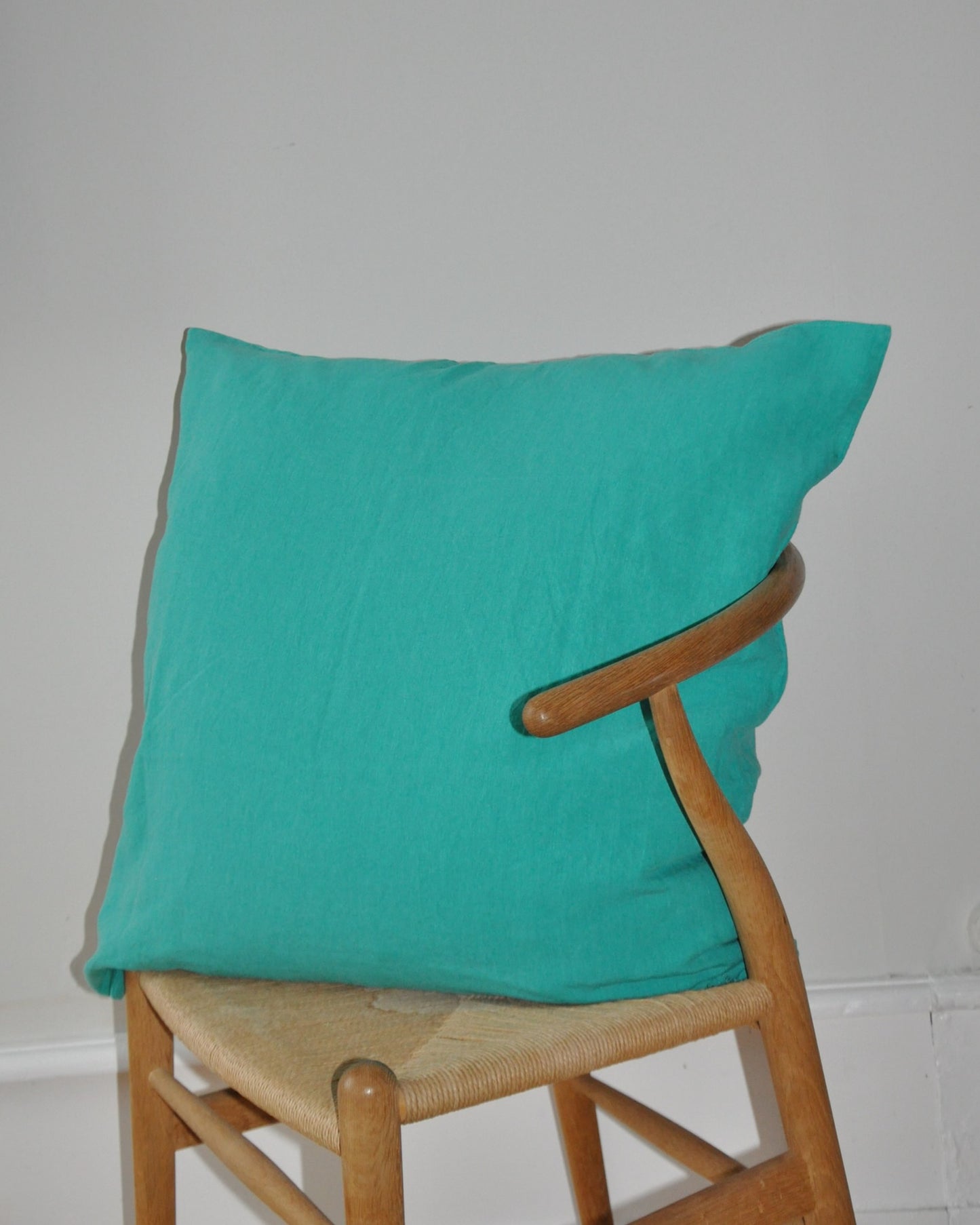 cushion cover in ocean green