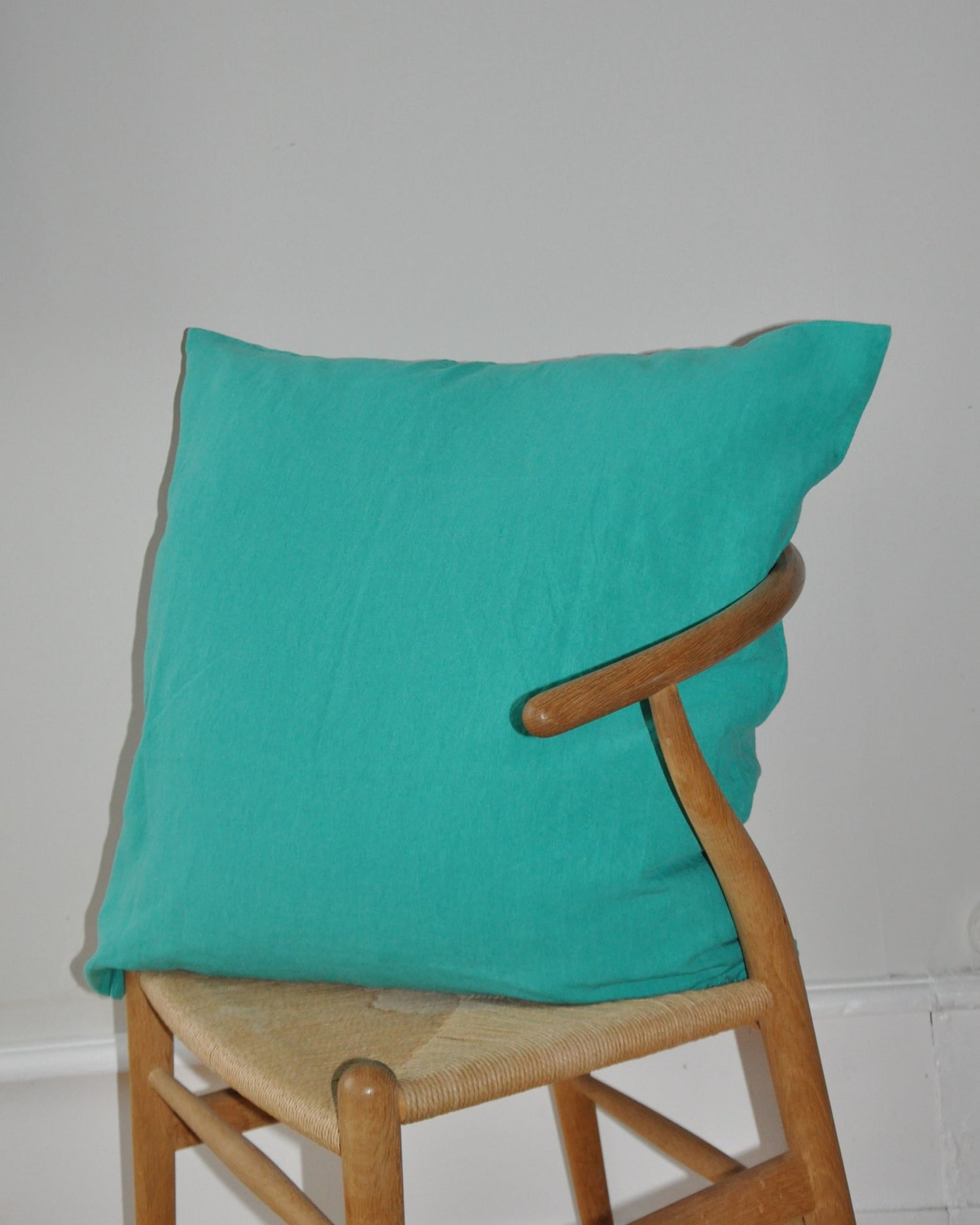 cushion cover in ocean green