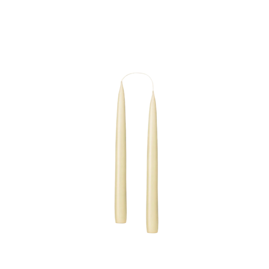 tapered candles in ivory