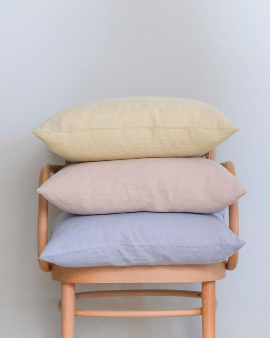 Cushion cover in oat yellow